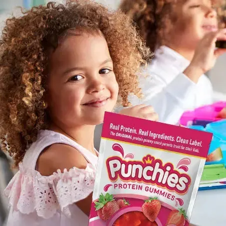 Vitamin gummies: a smiling girl with a bag of Punchies protein gummies